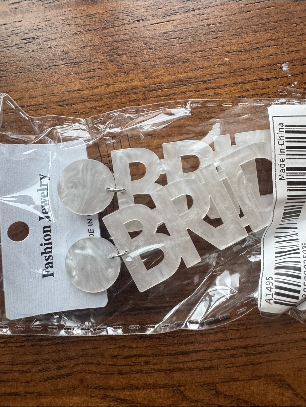 Bride acrylic earrings new in bag